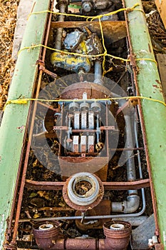 Detail of the interior mechanisms of an abandoned fuel pump at a gas station in Maryhill