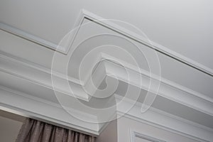Detail of intricate corner crown molding. a detail of corner ceiling