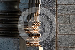 Detail of the jagged patterns on a stone pillar
