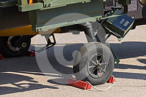 Detail of a landing gear with aircraft thrust pad of combat helicopter on apron