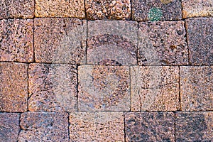 Detail of laterite wall stone, background and texture