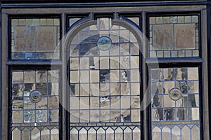 detail of leaded window with reflected light