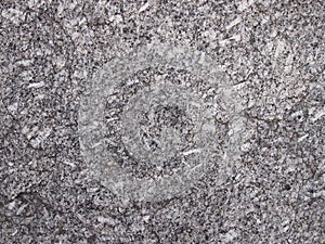 Detail look at Muscovite-biotite Granite stone photo