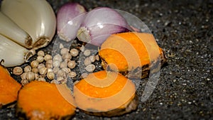 Detail look of spices consisted of coriander, garlic, onion. turmeric