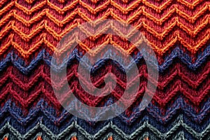 detail of machine-knit wool sweater pattern