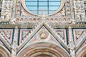 Detail from the main facade of the Duomo of Siena, Tuscany, Italy.