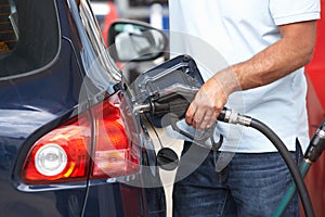 Detail Of Male Motorist Filling Car With Diesel