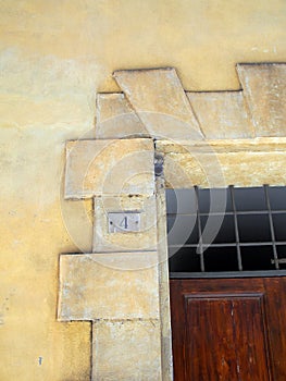 Detail of Marble Architrave on Historic Sienna Building, Italy