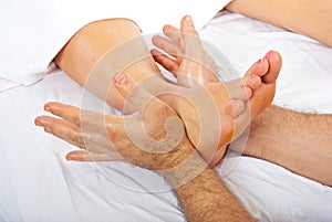 Detail of massage of foot photo