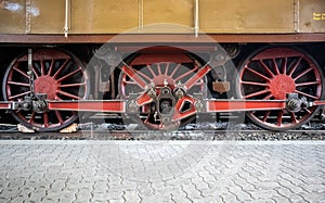 Detail of the metal wheels of an ancient steam train