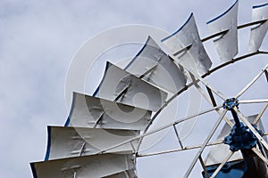 Detail of metal wind wheel in the Texas prairie