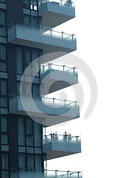 Detail of modern balcony with gradient glass panes. Contemporary architecture, urban living