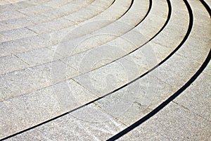 Detail of a modern curved stone staircase