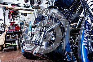 Detail on a modern motorcycle in the workshope. Motorcycle Exhaust. selective focus photo