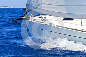 Detail of a sailing yacht in action photo