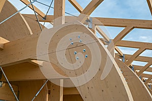 Detail of a modern wooden architecture in glued laminated timber