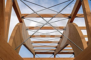 Detail of a modern wooden architecture in glued laminated timber photo