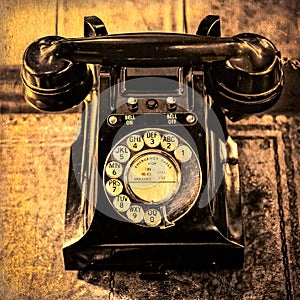 Detail monochrome view of old vintage dial telephone