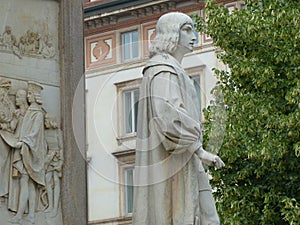 Monument of Leonardo da Vinci with a statue of a young disciple to Milan in Italy.