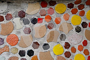 Detail of a multicolored glass mosaic on the wall, mosaic background, texture