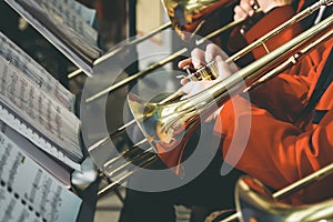 Musician playing on trumpet at concert