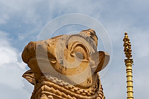 Detail of Nandi statue at the Brihadeeswarar temple in Gangaikonda Cholapuram, Tamil Nadu, South India on overcast day