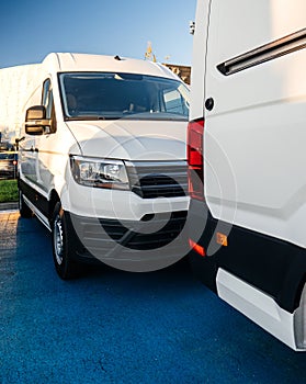 Detail of new industrial truck mini van delivery car fleet showroom
