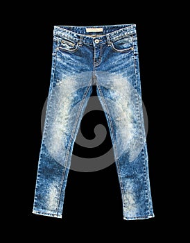 Detail of nice blue jeans on black background