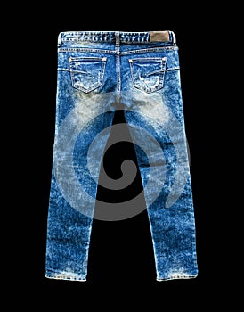 Detail of nice blue jeans on black background