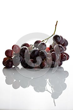 Red grape cluster isolated on white background