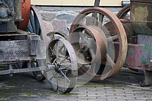 Detail of an old agriculture machinery. Rustedmetal. Metaltexture. Vintage background. Retro machinery.