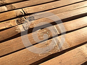 Detail of an old bamboo table in the sunshine. Close up of bamboo table. Empty bamboo table or meja bambu photo