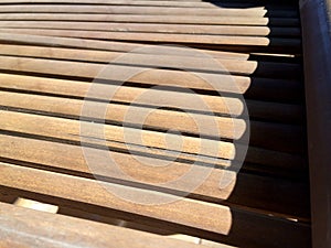 Detail of an old bamboo table in the sunshine. Empty bamboo table or meja bambu. Close up of bamboo table photo