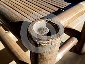 Detail of an old bamboo table in the sunshine. Empty bamboo table or meja bambu. Close up of bamboo table photo