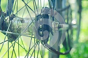 Detail of an old bicycle wheel with chain