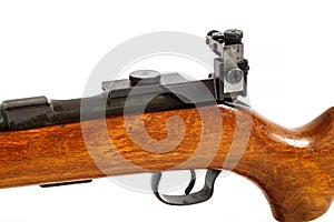 Detail of old bolt action rifle isolated