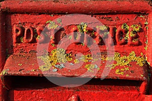 A detail of an old British Red Postbox