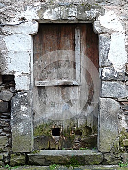 Detail of old door in the town of Hecho. Pyrenees of Aragon. Spain photo