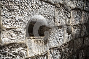 Detail of an old Holy Water font at a Maronite stone church in Lebanon