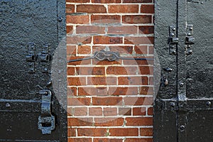 Detail of old metal door in Red Hook, Brooklyn, New York