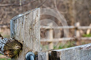 Detail of old rural fencing with shallow focus on single fence post