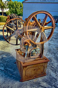 Detail of old rusted machinery in a winery 9