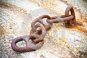 Detail of an old rusty metal chain