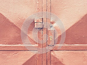 Detail of rusty metal lock latch on the old door. Old fashion door gate