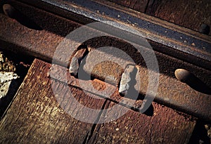 Detail of an old rusty rail joint