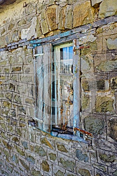 Detail of Old Stone House With Window Shutter, Greece