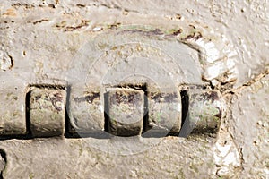 Detail of an old surface with exfoliated paint and rivets on military equipment. Military background