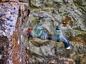 Detail of an Old Tarnished Water Tap