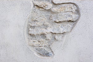 Detail of an old wall, highlighting the primitive stones photo