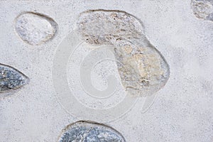 Detail of an old wall, highlighting the primitive stones photo